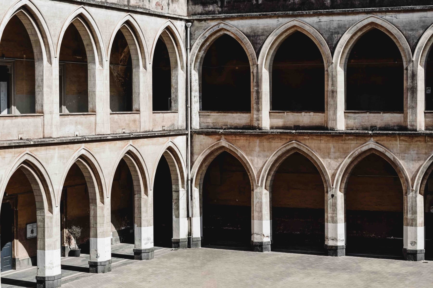 Two storeys of gothic arches around the inner courtyard.